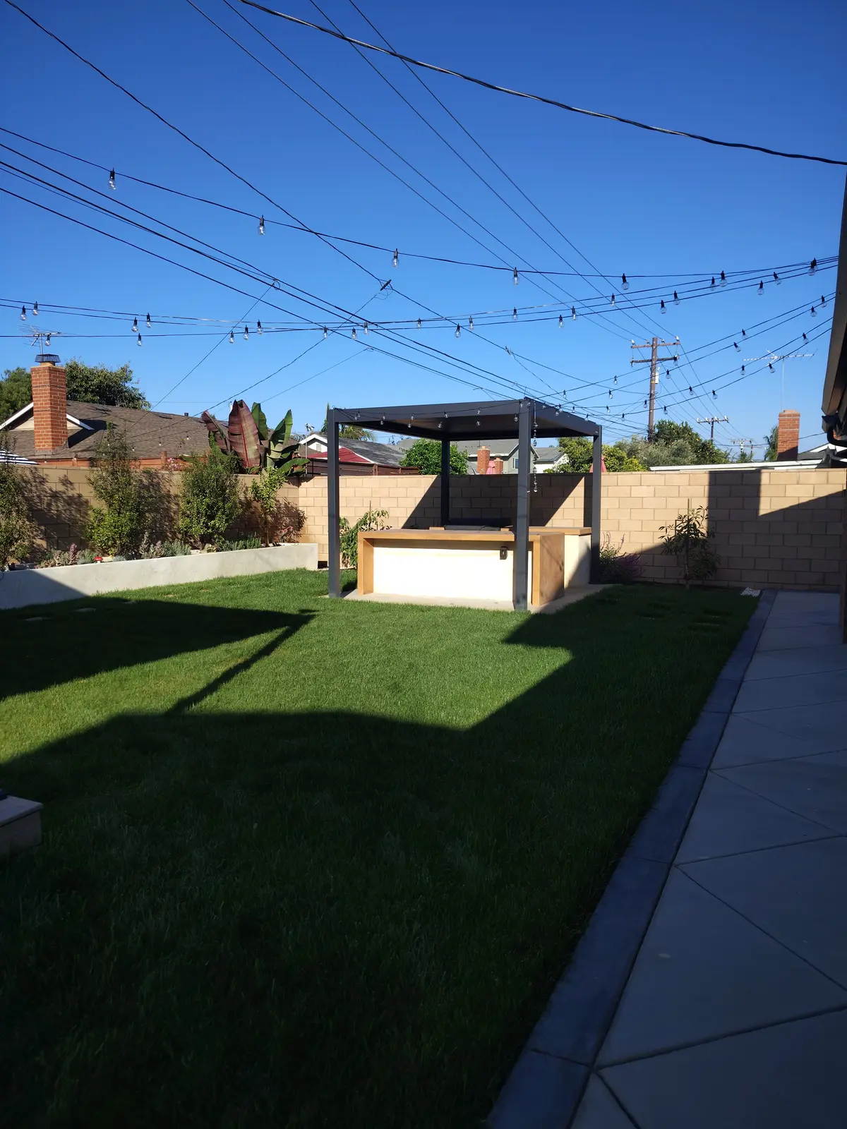 Modern Pergola & Outdoor Kitchen — completed view 2